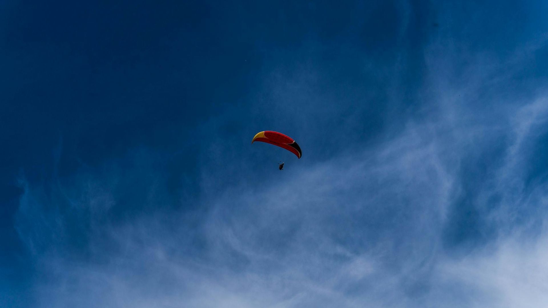Person doing dynamic movements in a bright airy space