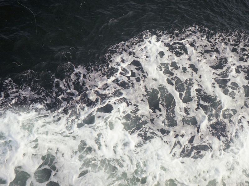 Person moving with fluid motion in a sunny room